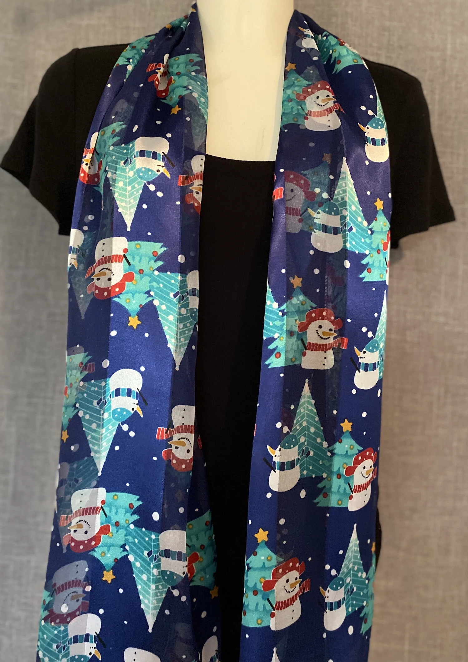 oblong_satin_scarf_with_snowmen_on_blue.jpg