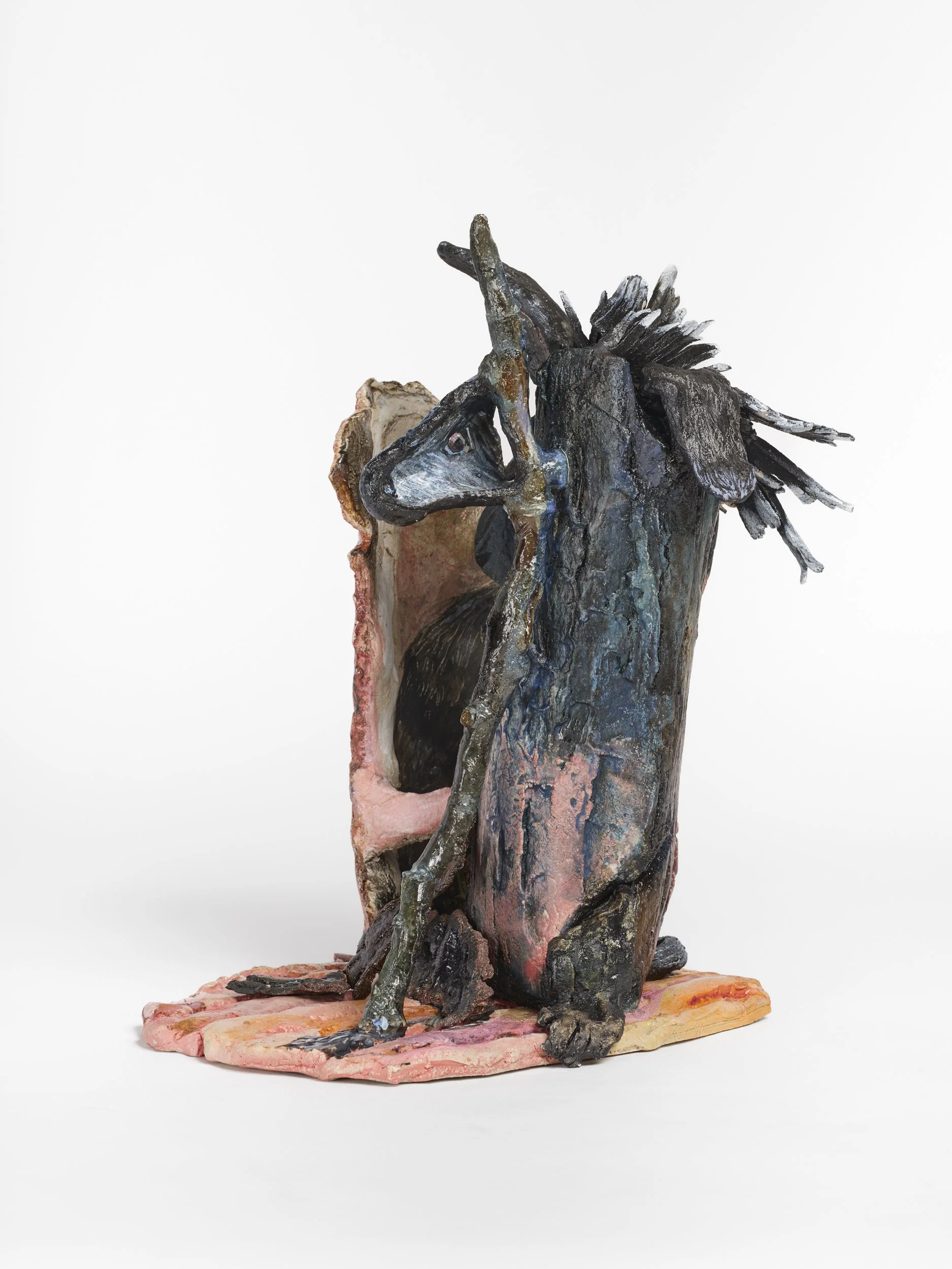 Barking up a Tree: Tree, Woman and Dogs, 2025, glazed ceramic and flashe paint, 17 x 9 x 12 inches