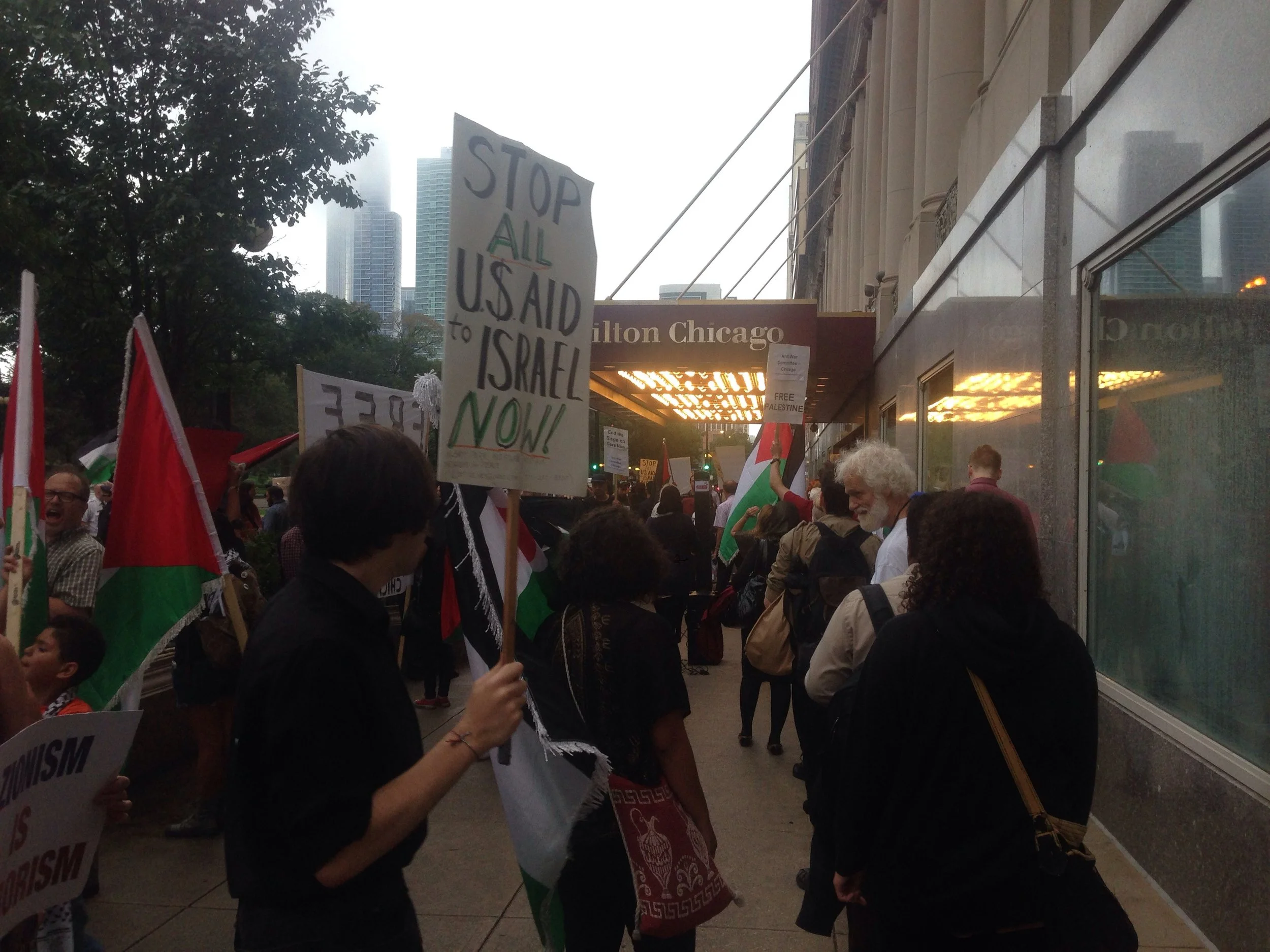 Demonstrators picket outside of the Hilton Chicago, 720 s. Michigan ave., while a fundraiser for the Israeli Defense Forces occurred inside the hotel on Aug. 21. | Nader Ihmoud