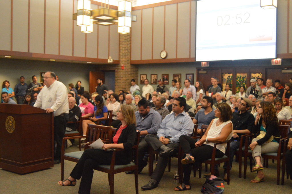 The Village Hall in Lincolnwood was filled to capacity Aug. 11 for the meeting about the Palestinian flag hanging in the village held by the Human Relations Commission. Many of the attendees were given 3 minutes to speak to whether or not the flag should be kept. | Nader Ihmoud