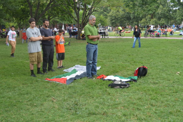  Aug. 2, 2014 | Muslim protestors pray on the lawn after the march to the White House. 