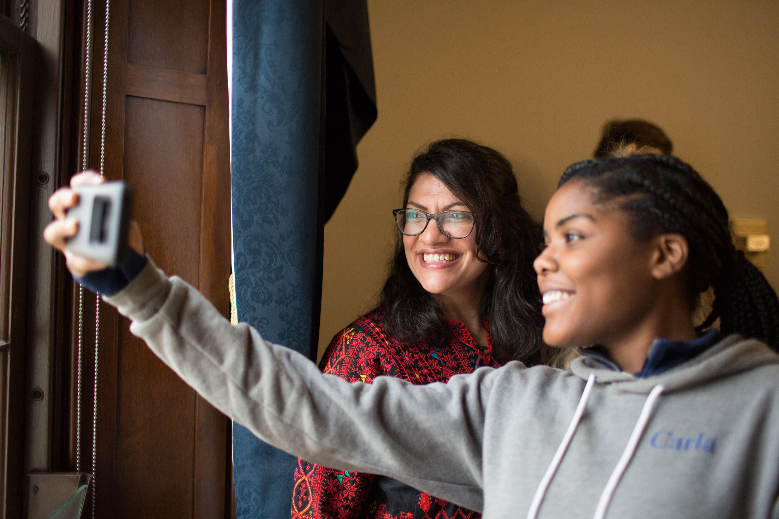  U.S. Rep. Rashida Tlaib poses for a selfie with Carla, a supporter and constituent, immediately before the swearing in of the 116th Congress in Washington D.C., Thursday, Jan. 3, 2019. 