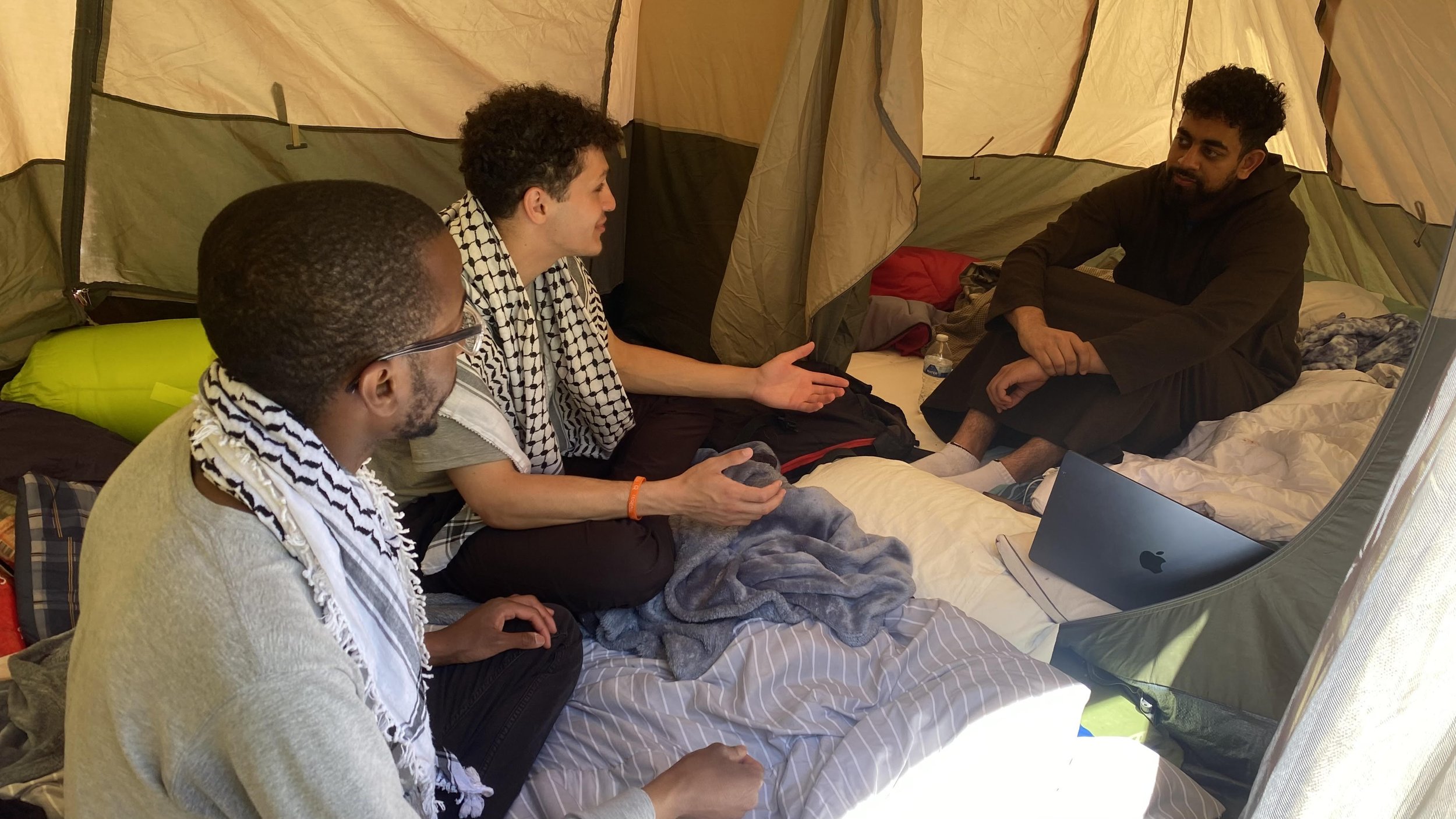 muslim students inside tent.jpg