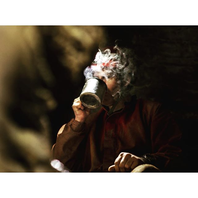 Mysterious coffee man.  It was so cold and damp in the cave, the heat of a warm drink caused a near mask of beautiful mist to swirl and move across his face. It infused the little cave cubby whole where we stopped for lunch with a the very welcome an