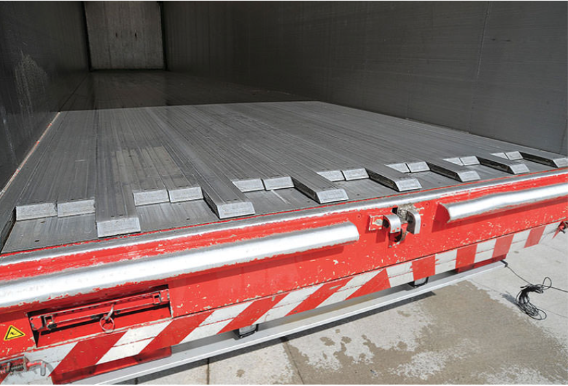 Close up of the ‘Moving Floor’ plates, within the enclosed trailers, that push the waste feedstock out into the indoor reception bunker.
