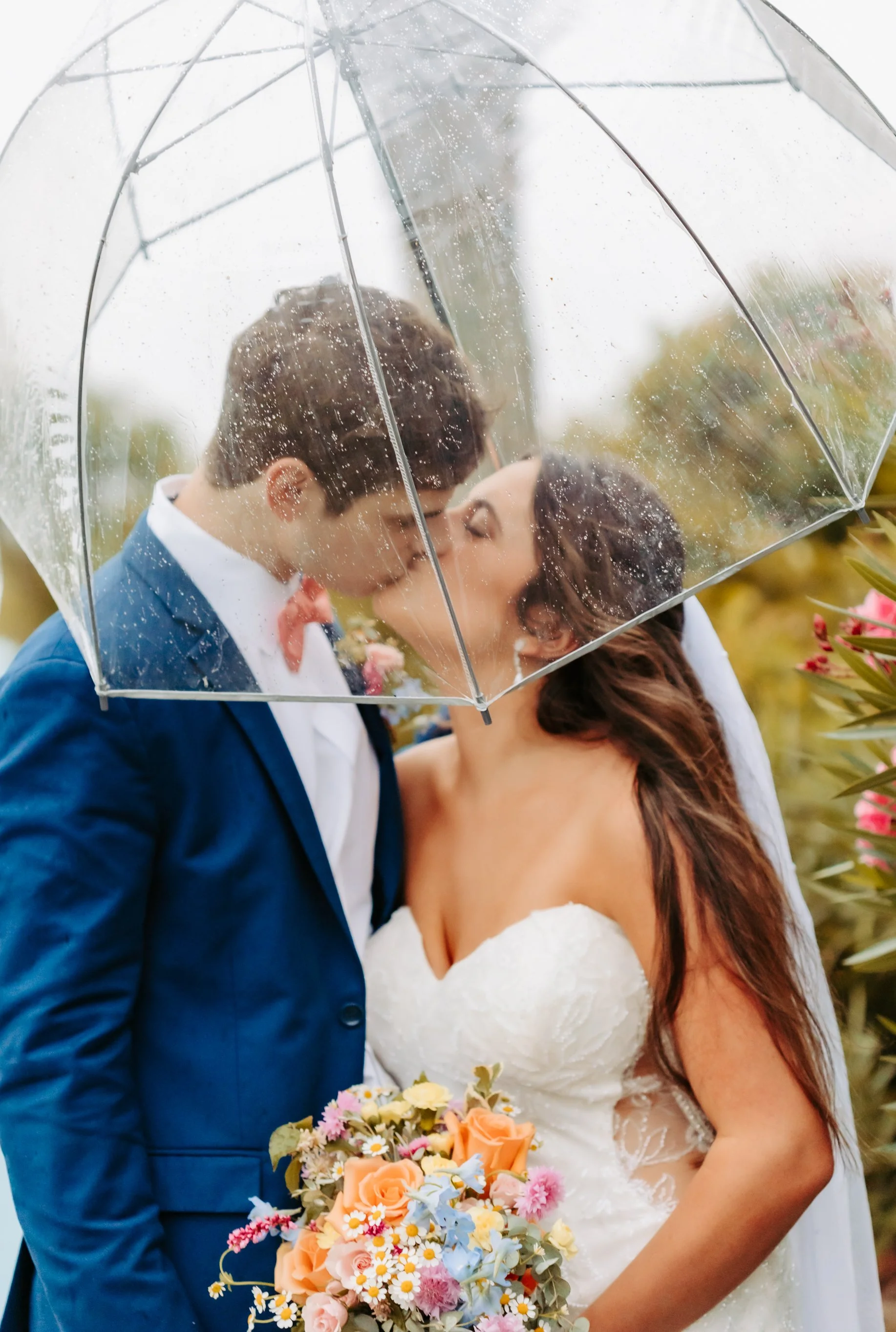 How do you handle unexpected weather conditions during an outdoor wedding?
