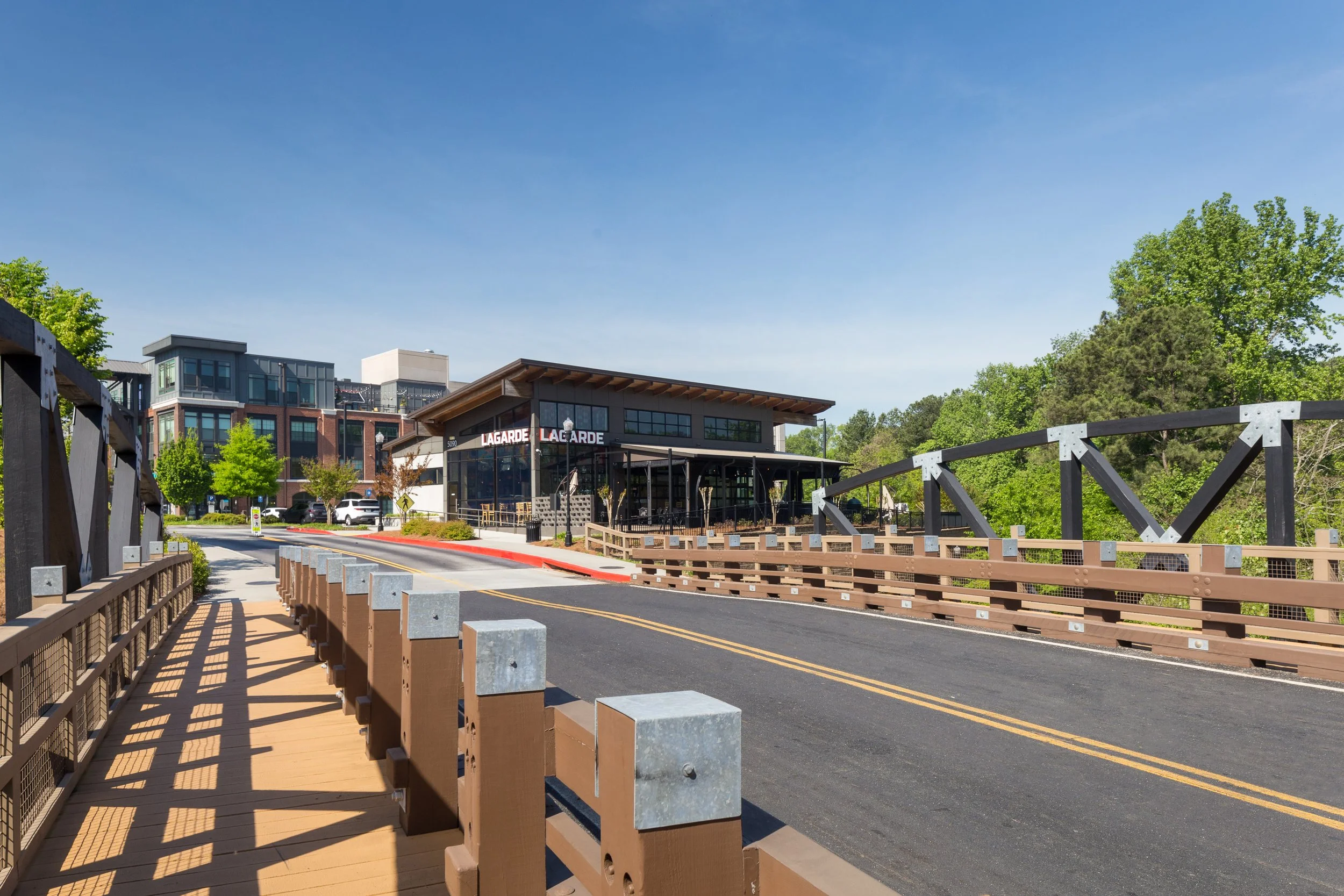 A pedestrian walks through Town Brookhaven, a mixed-use