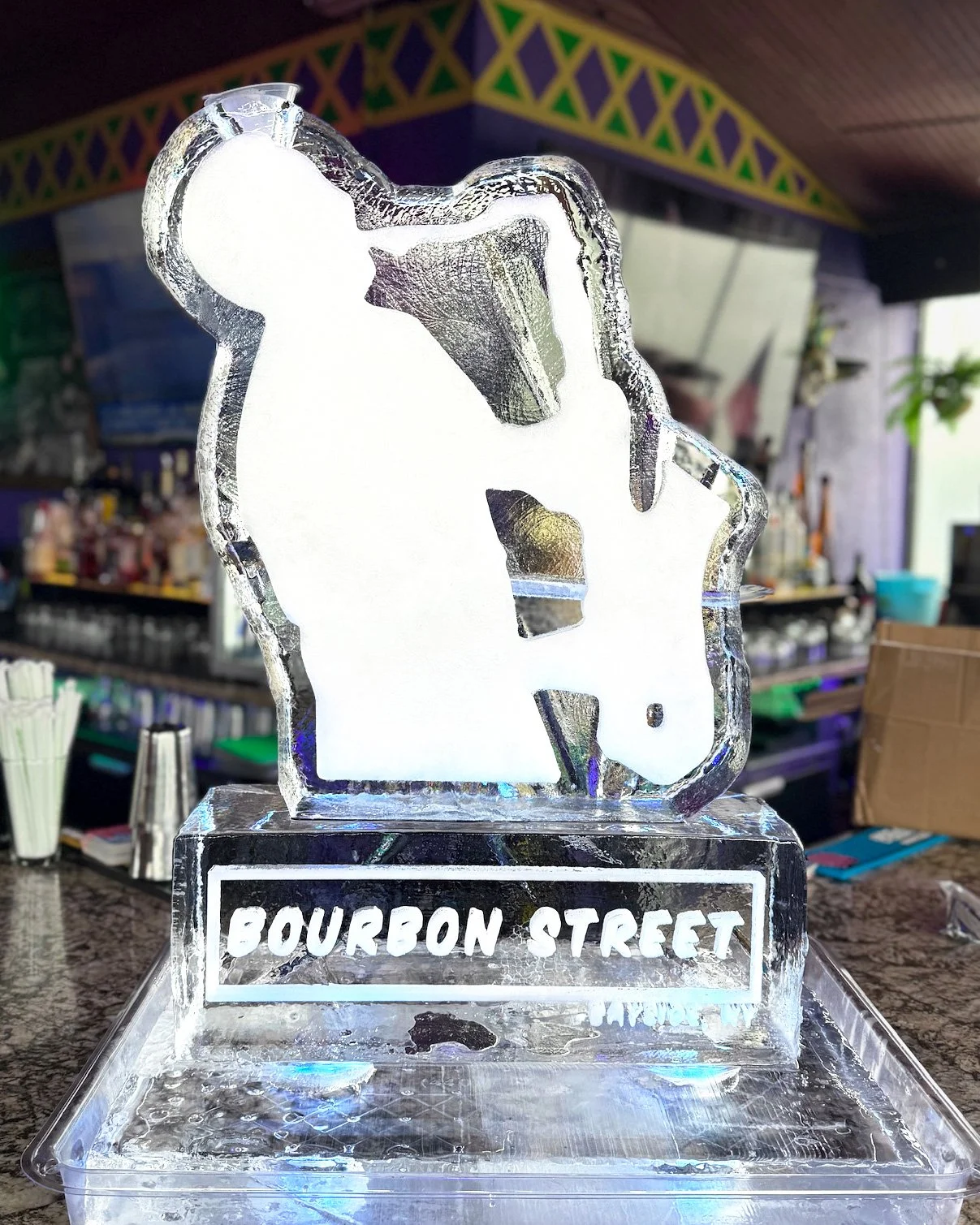 060925-saxophone-player-image-snowfill-logo-riser-bourbon-street.jpg