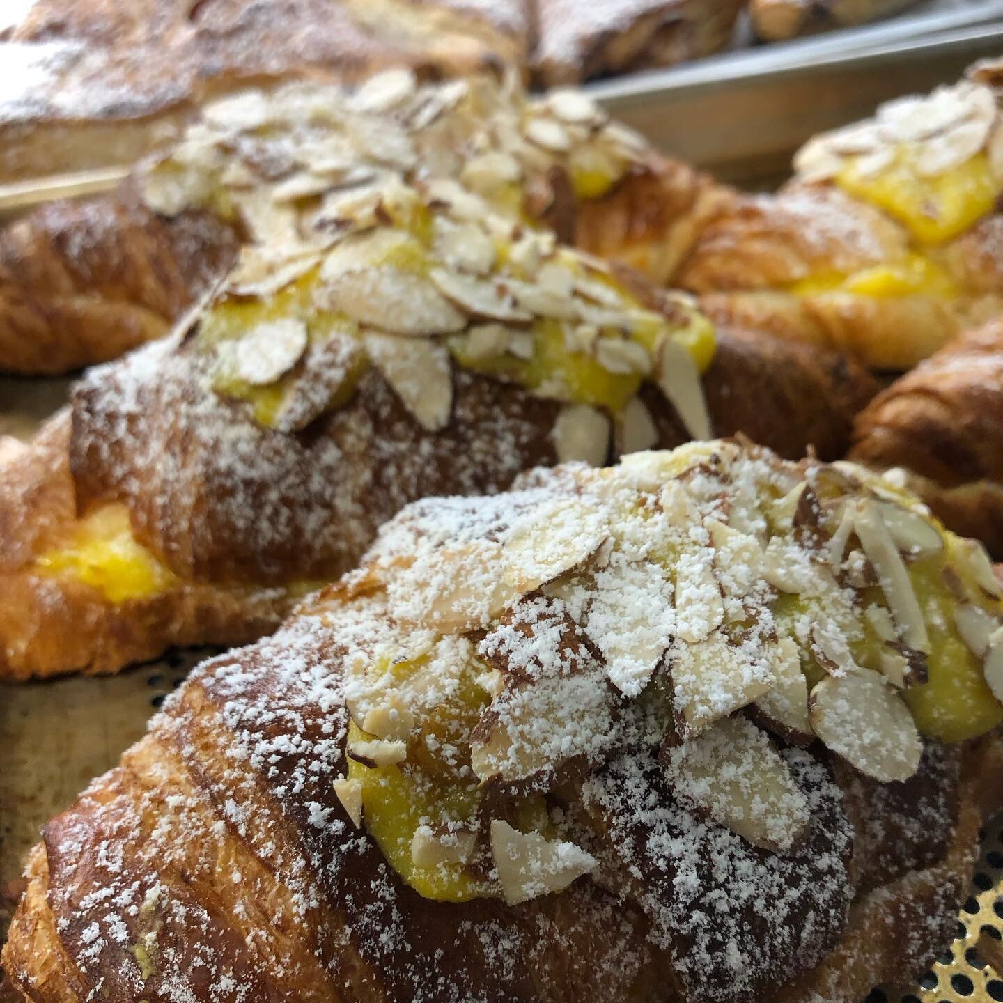 Buttery Croissants! We have two classics - Not-too-sweet lemon almond curd (first pictured) or classic butter croissant (second picture)! 

We&rsquo;re open Wednesdays 10-5pm, and Thursdays through Saturdays 10-6pm! 

#robsgoodfood  #localbusiness #e