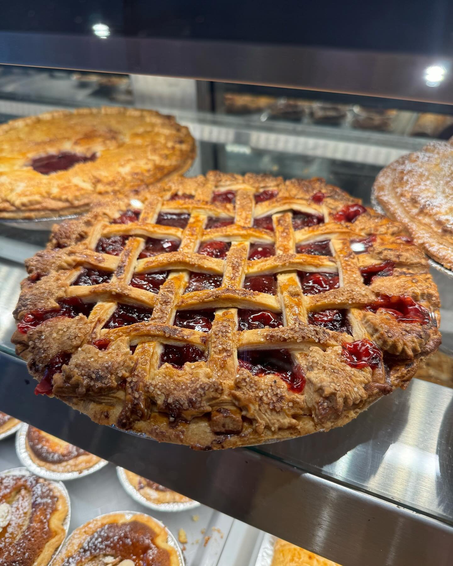 Just another shot of our large size pies available today! Pictured is our Sour Cherry with a gorgeous lattice crust! We&rsquo;re open today 10am to 5pm! 🍒 🥧 

Reminder our storefront is open during road construction and parking is now available alo