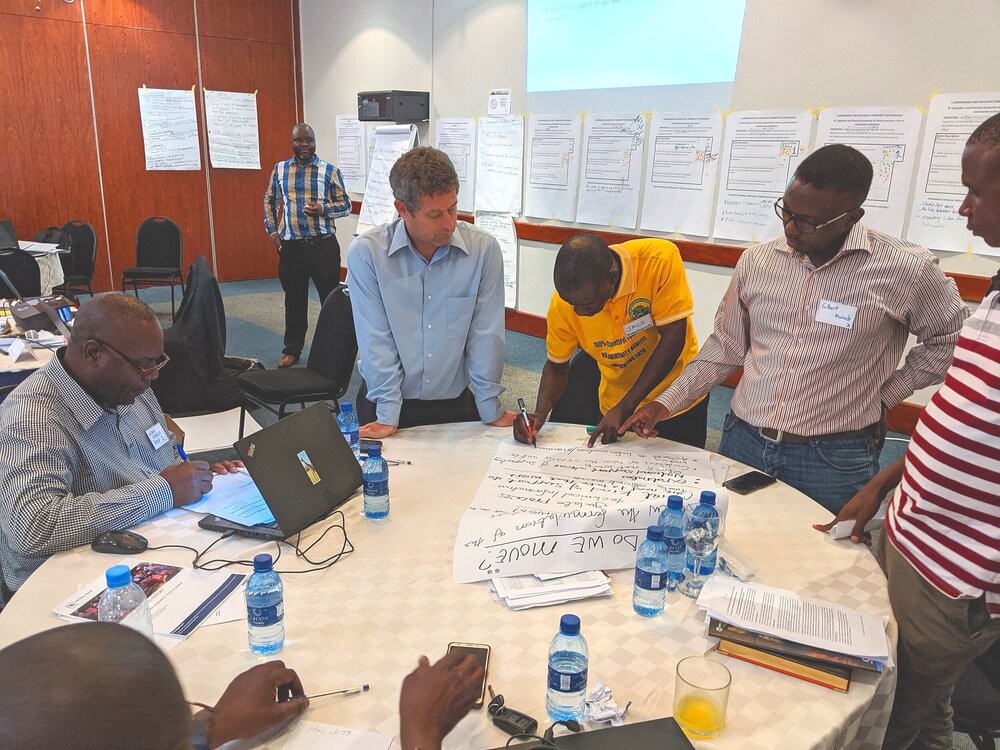 Photo 4: Tetra Tech’s Matt Sommerville facilitating drafting of stakeholder policy recommendations