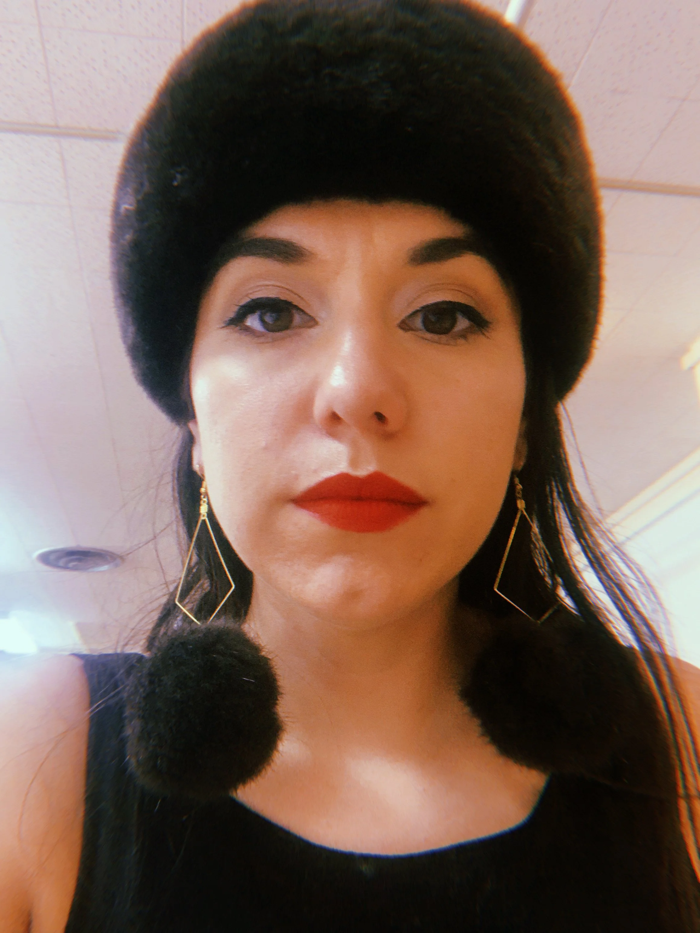 Sea otter fur pompom earrings