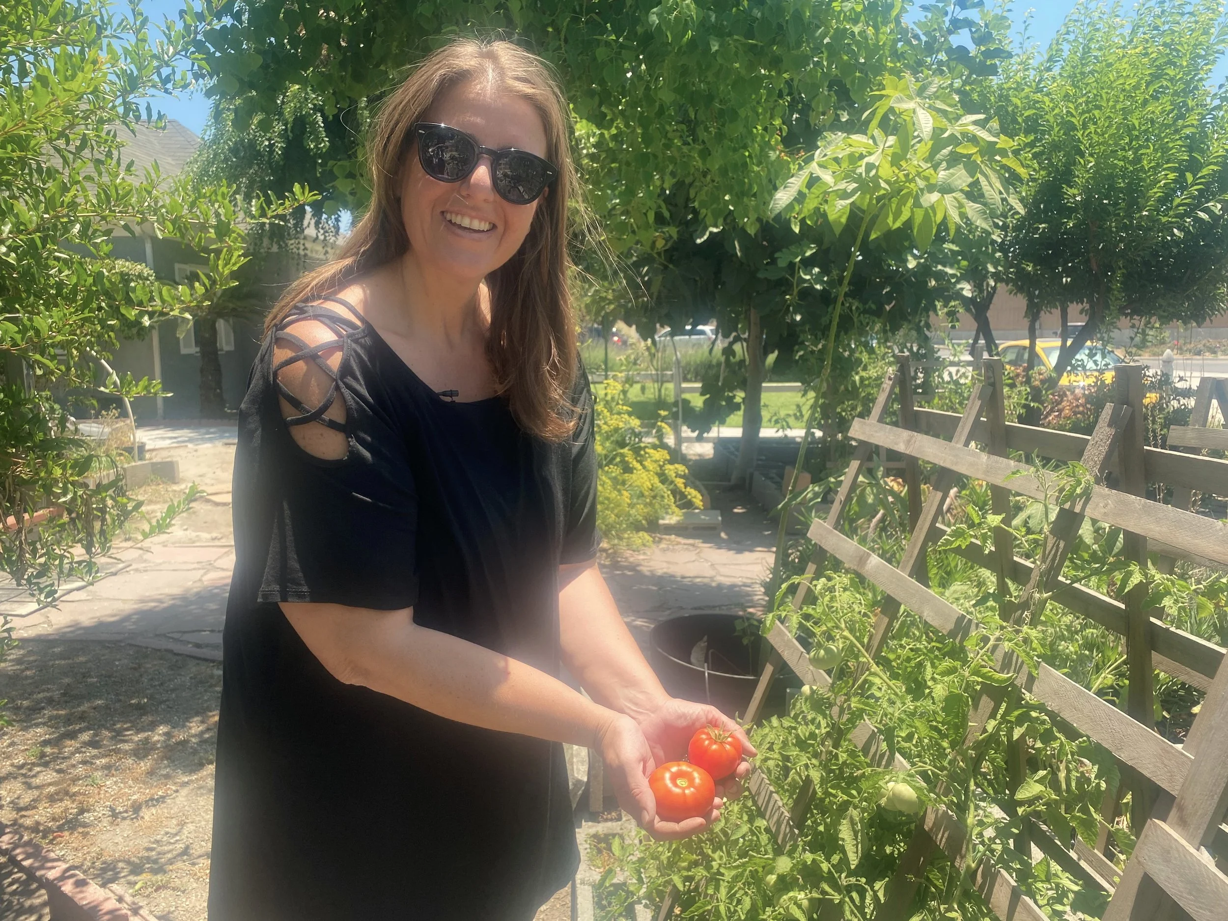  As Arianna gave a tour of the garden, she picked vegetables for our afternoon feast. 