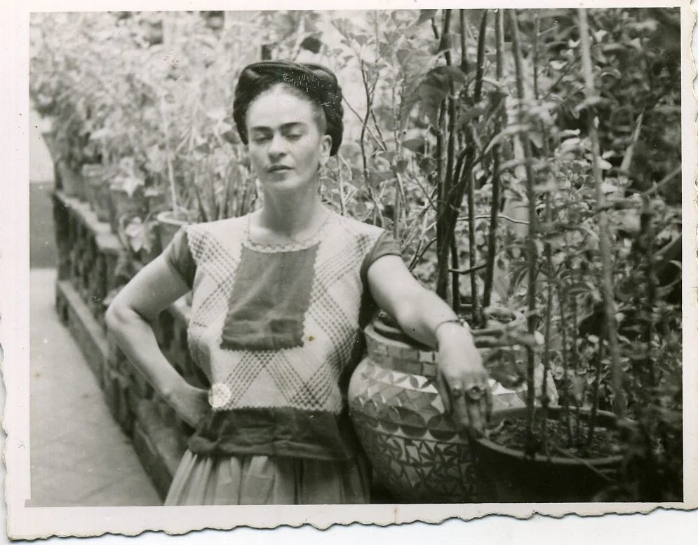 Friday Kahlo in her garden. Courtesy of Museo Frida Kahlo.