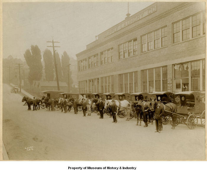 Drivers_and_horsedrawn_vehicles_at_Supply_Laundry_Company_Seattle_1917.jpg