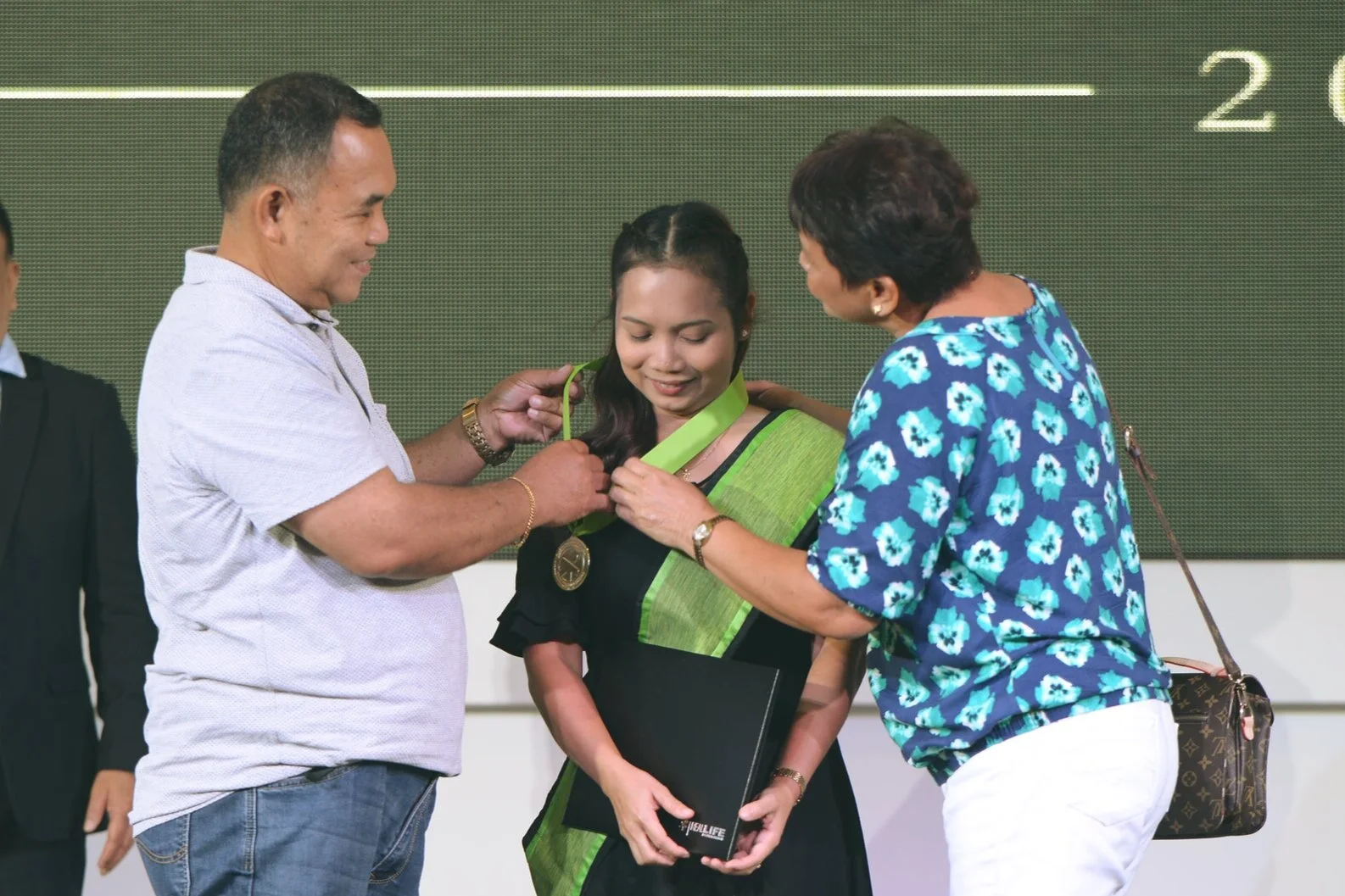 With her parents as her inspiration, Jonalyn graduated cum laude.