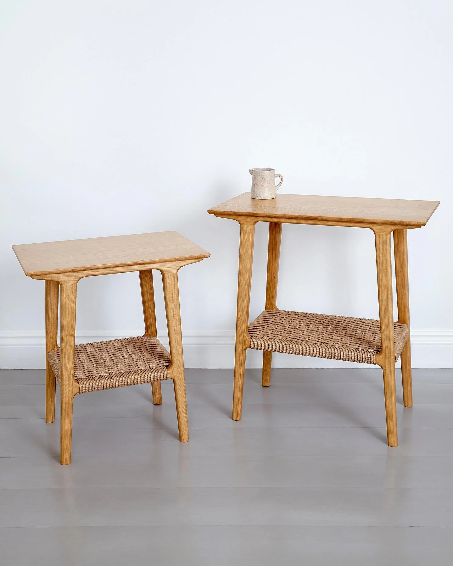 Introducing the Otto Table. Available in small and large versions, these mid-century inspired pieces are made from sustainable European oak with a hand-woven Danish cord shelf below. Perfect as a bedside table or beside the sofa in your living room. 