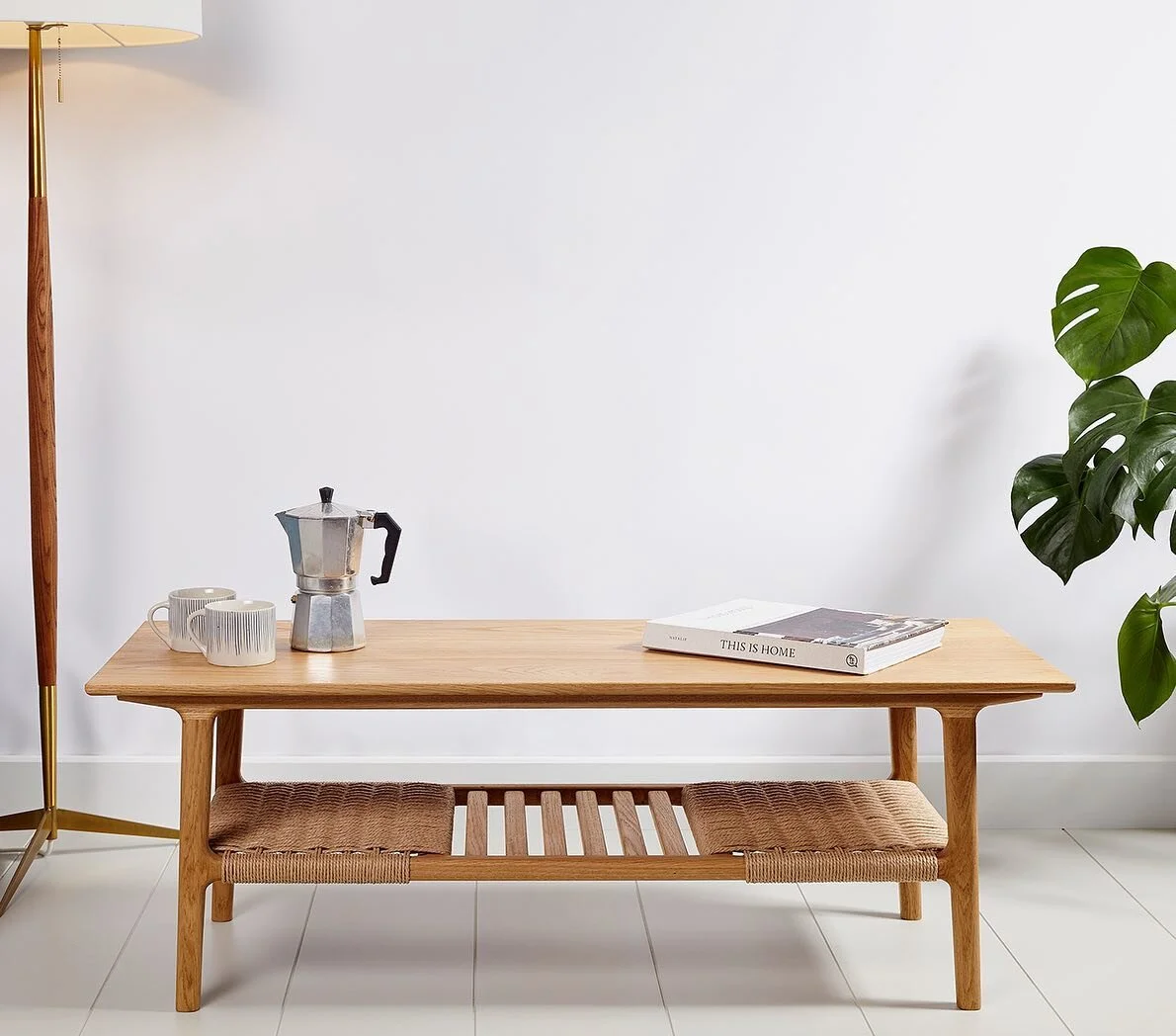 New to the House of Hobson online shop: The Linus Coffee Table! Inspired by mid-century Scandinavian design, this hand made piece incorporates subtlety curved joints and tapering legs and a danish cord and slatted lower shelf. Shown here in fsc prime