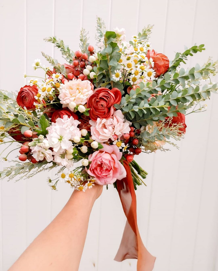  Sweet Afton Floral of Logan, Utah creates a bridal bouquet perfect for a Valentine’s Day wedding! red, blush pink and white bridal bouquet, frosted green wedding bouquet filler, red ribbon on bridal bouquet, custom bridal bouquet, floral designer in