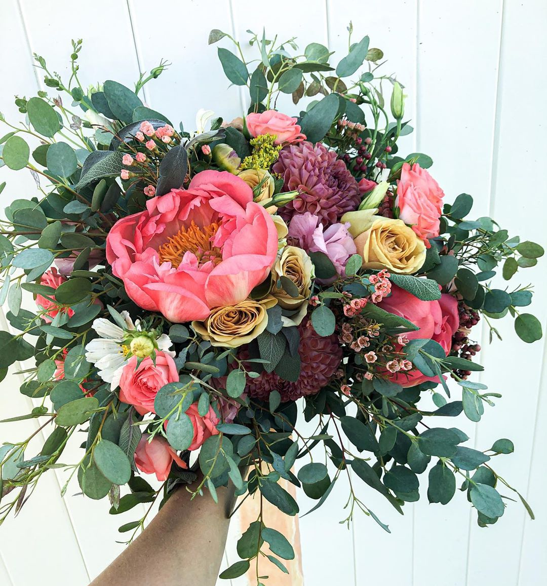  A bridal bouquet fit for a fairytale, this custom wedding bouquet by Sweet Afton Floral pairs deep pink florals with eucalyptus greenery. professional cache valley utah floral designer, logan utah custom florals, wedding bouquet, deep pink colored w