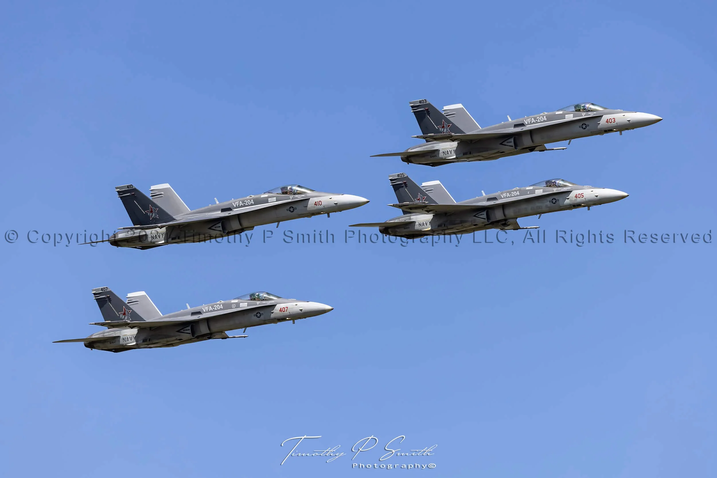 Four-ship F/A-18C Hornet diamond formation led by “River 2” from VFA-204 River Rattlers at the 2020 New Orleans Airshow.
