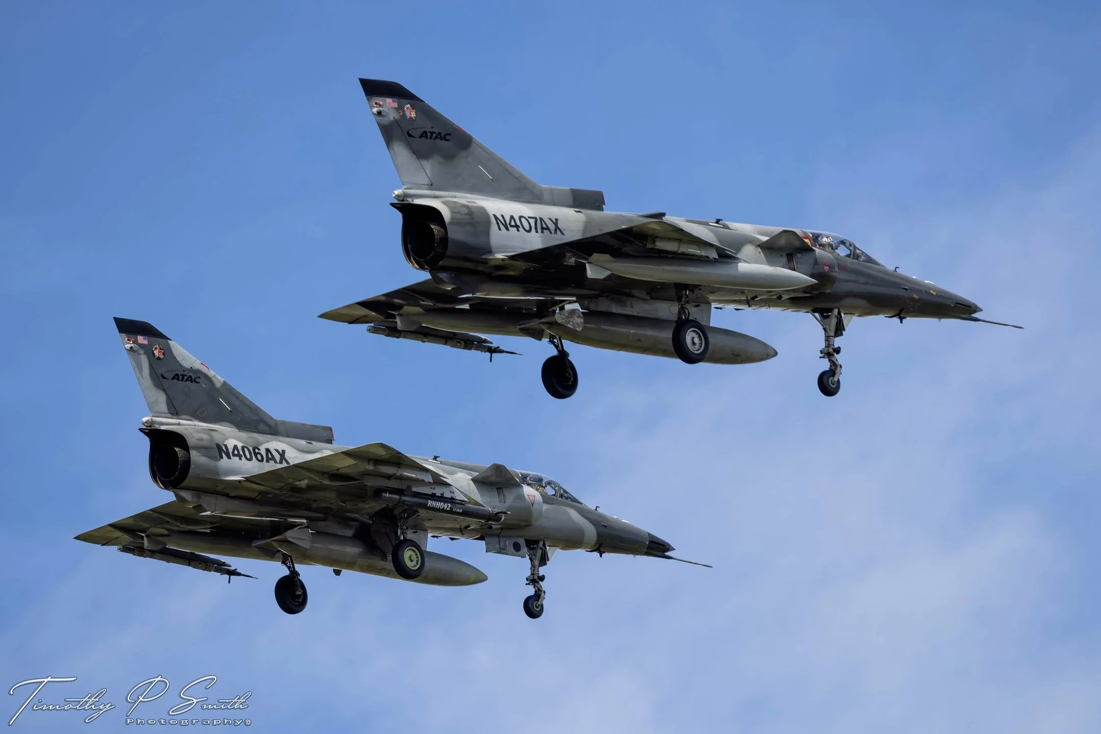 Capturing the thrill of the chase! ATAC dynamic duo of Israel, Aircraft Industries Kfirs (N406AX &amp; N407AX), descend into NAS JRB New Orleans, wrapping up a day of Threat Simulation maneuvers over the Gulf of Mexico. 🛬✈️ 

#NASJRBNewOrleans 
#ATA