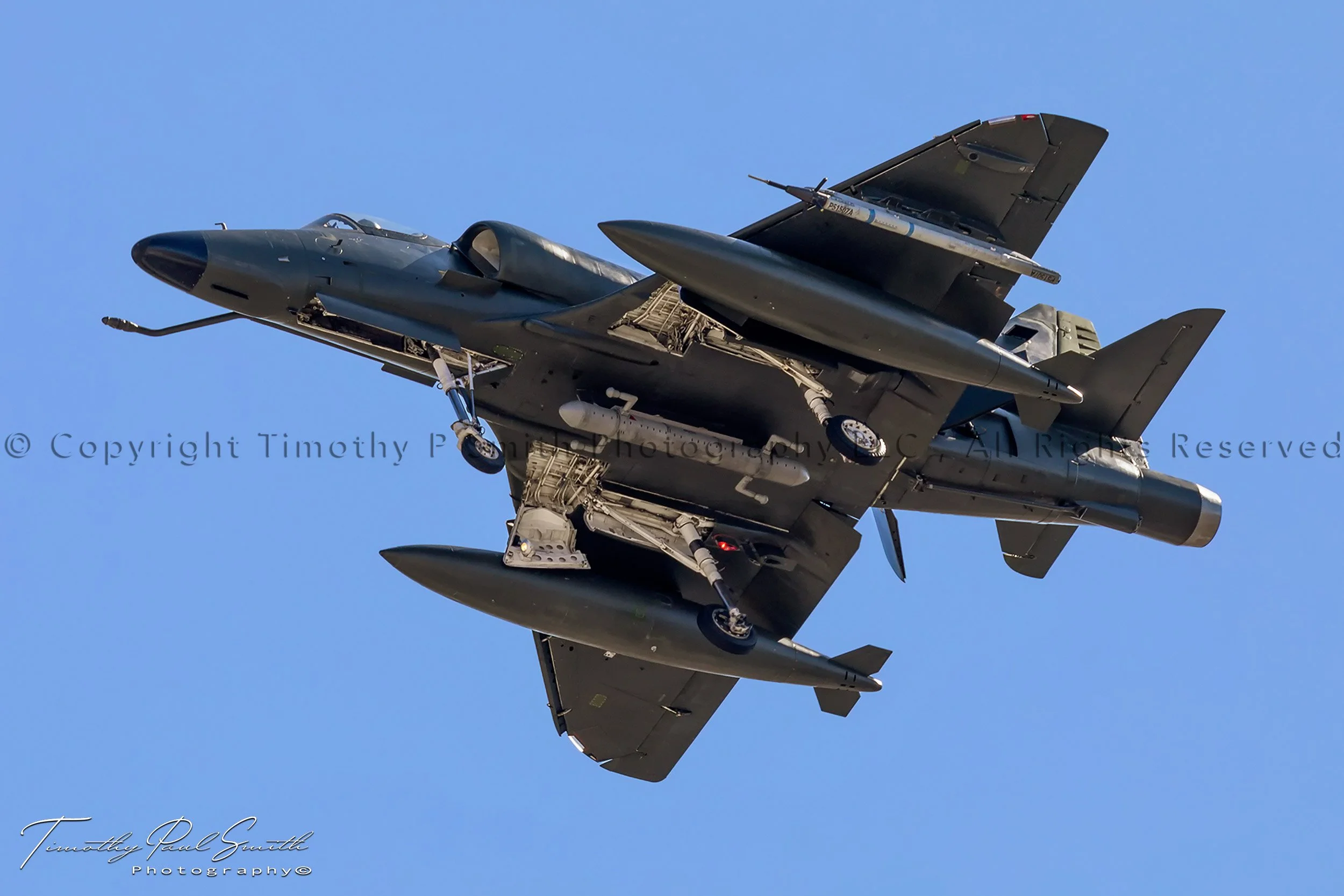 Draken Douglas A-4 Skyhawk landing with gear down and speed brakes deployed at Red Flag