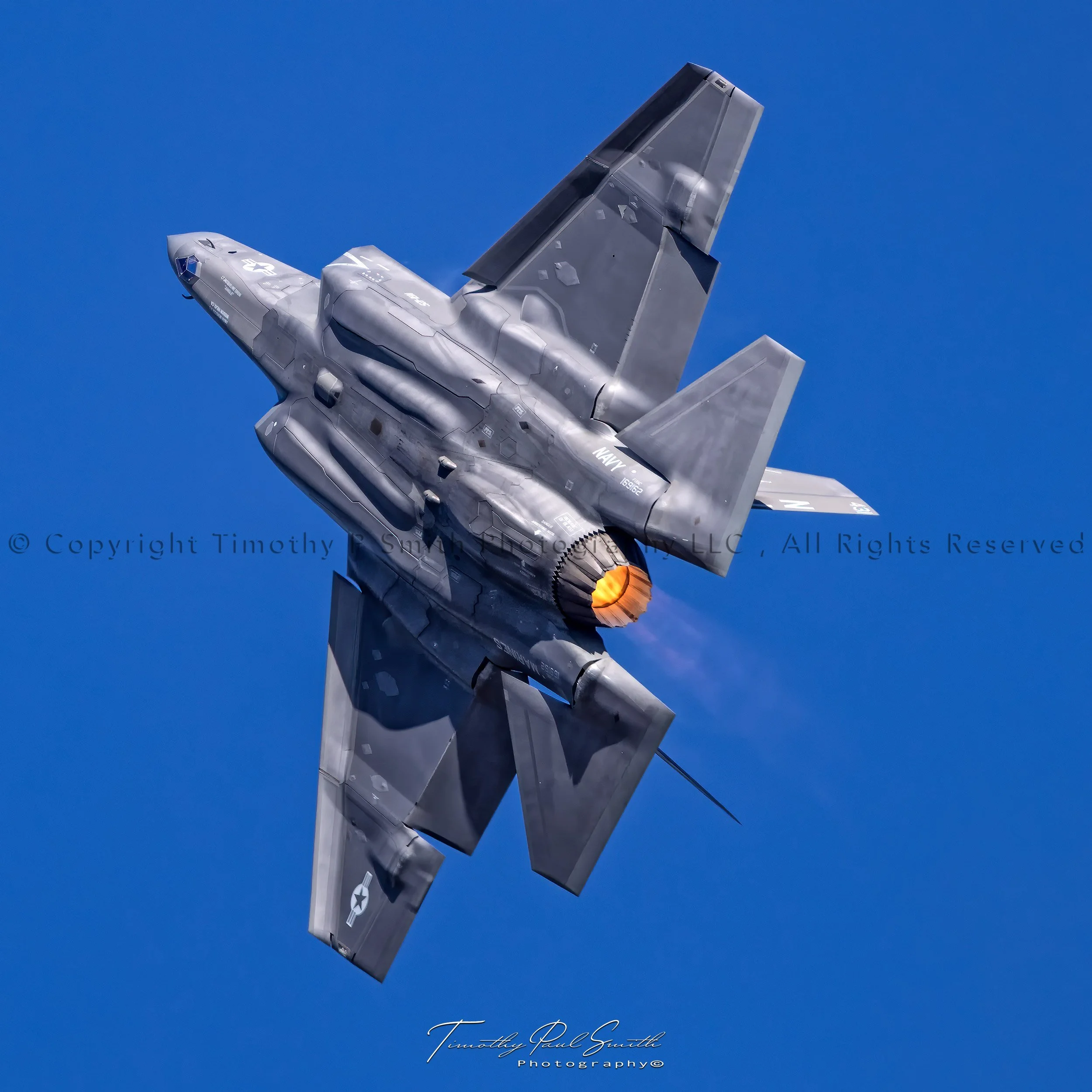 LCDR Daniel Slater igniting full afterburner in the U.S. Navy F-35C Lightning II over NAS Pensacola.