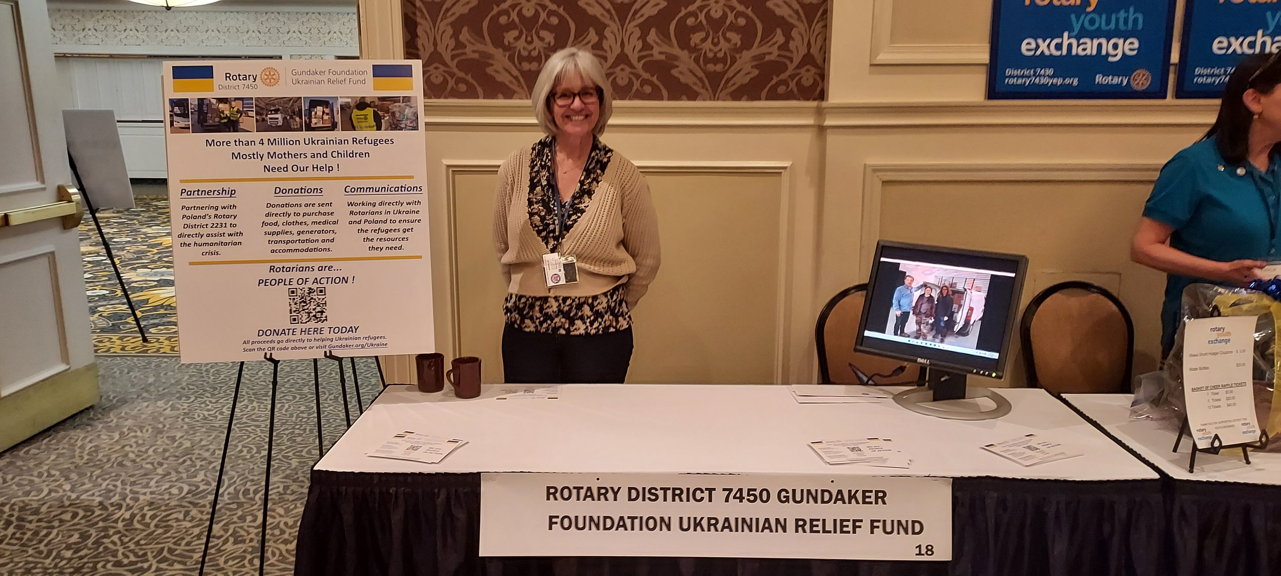  Philadelphia Rotary member Carrie Sharpshair at Ukrainian relief fund table. 