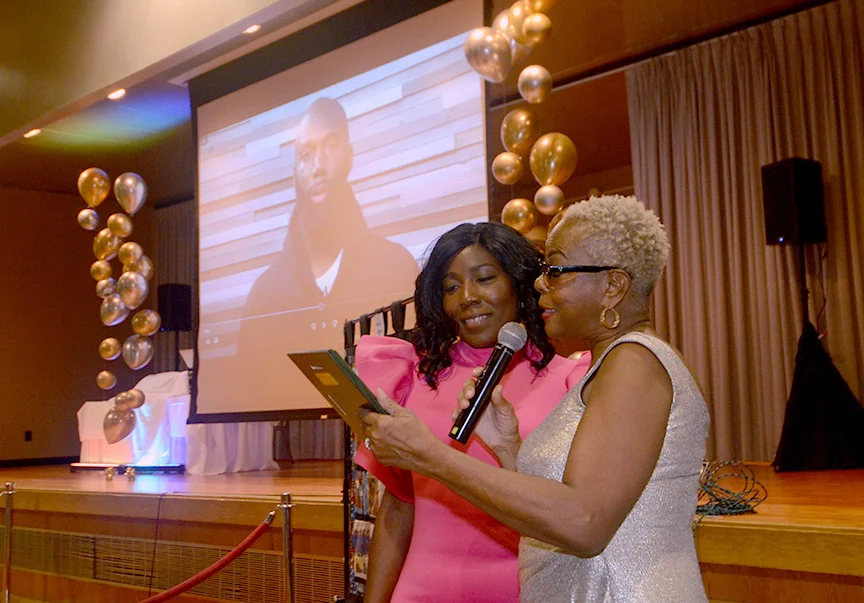 MOTHER'S IN CHARGE PRESENTS FAVORITE SON AWARD TO MALCOLM JENKINS