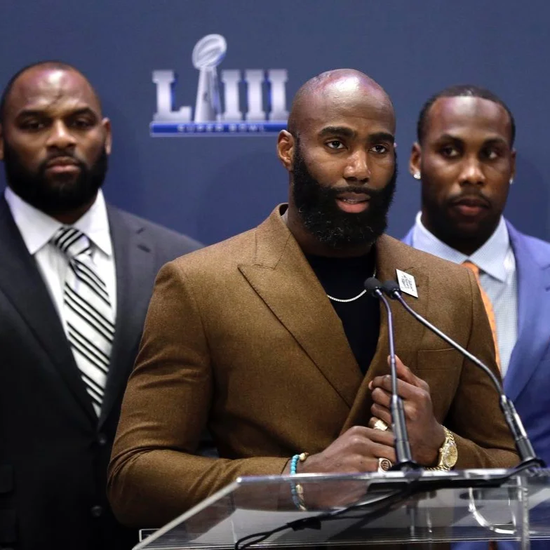 Eagles safety Malcolm Jenkins, center, speaks at a Players Coalition Charitable Foundation news conference in Atlanta during Super Bowl week last January. (David J. Phillip/AP)