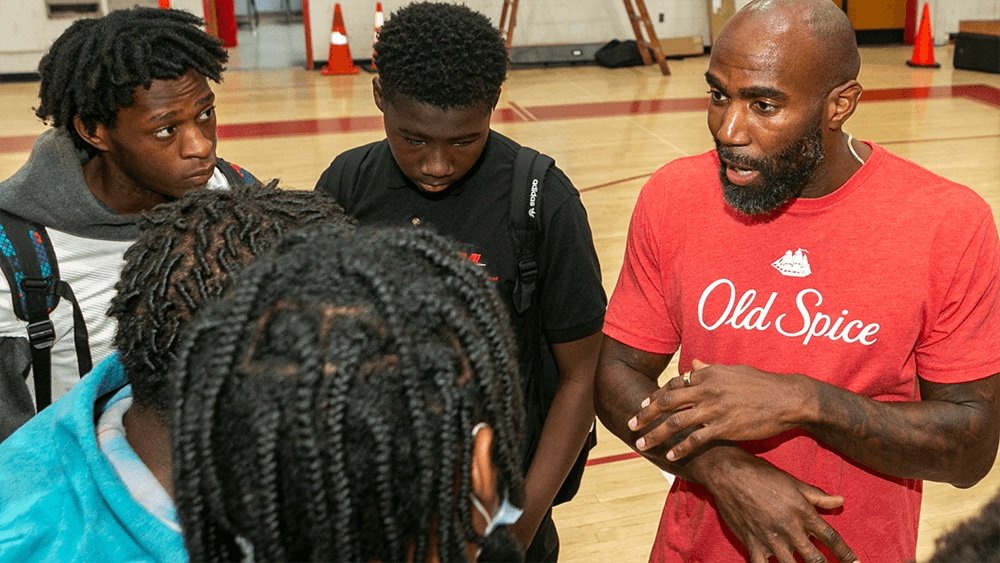 10.12.22_Old_Spice_School_of_Swagger_Malcolm_Jenkins_with_Students__1_.jpg