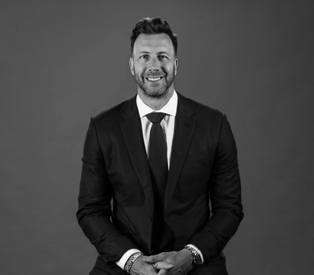 CONNOR BARWIN HEADSHOT.png