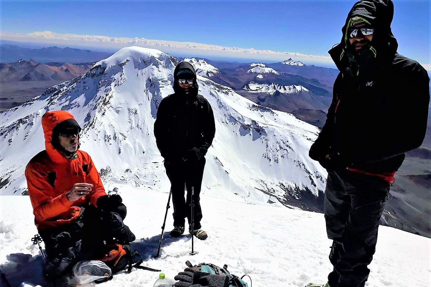  Group of climbers on the summit of Parinacota volcano 