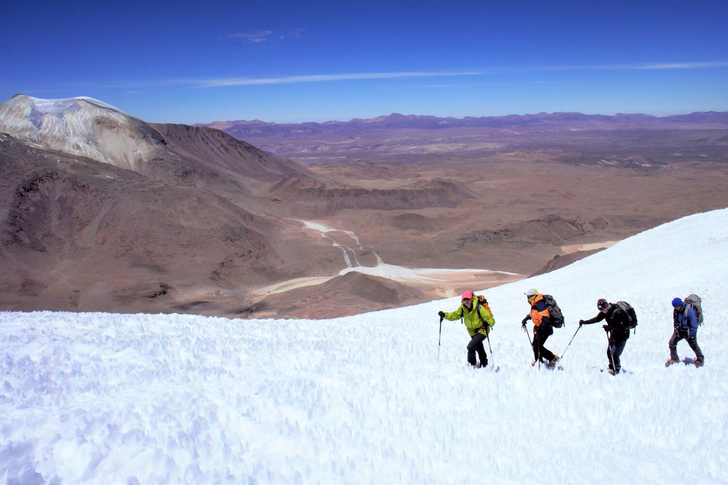  On the glacier of Acotango volcano, heading to its summit. Sajama National Park. Bolivia  