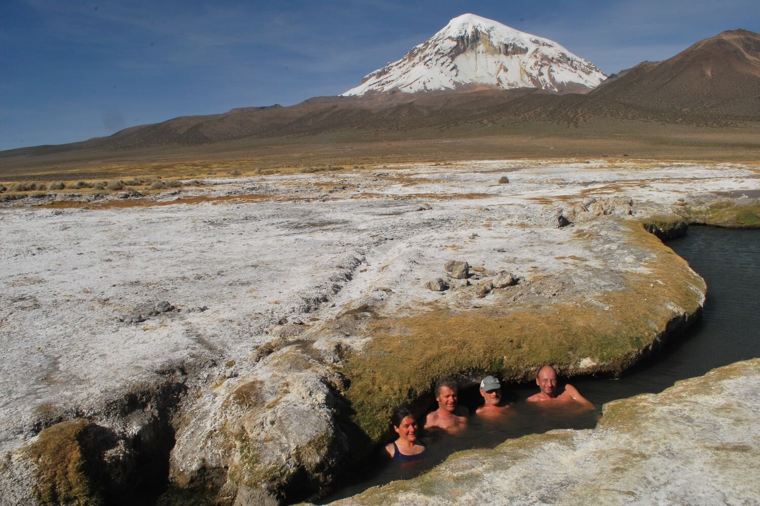  Climbers enjoying the hot springs in the nearest of Sajama village, Bolivia 