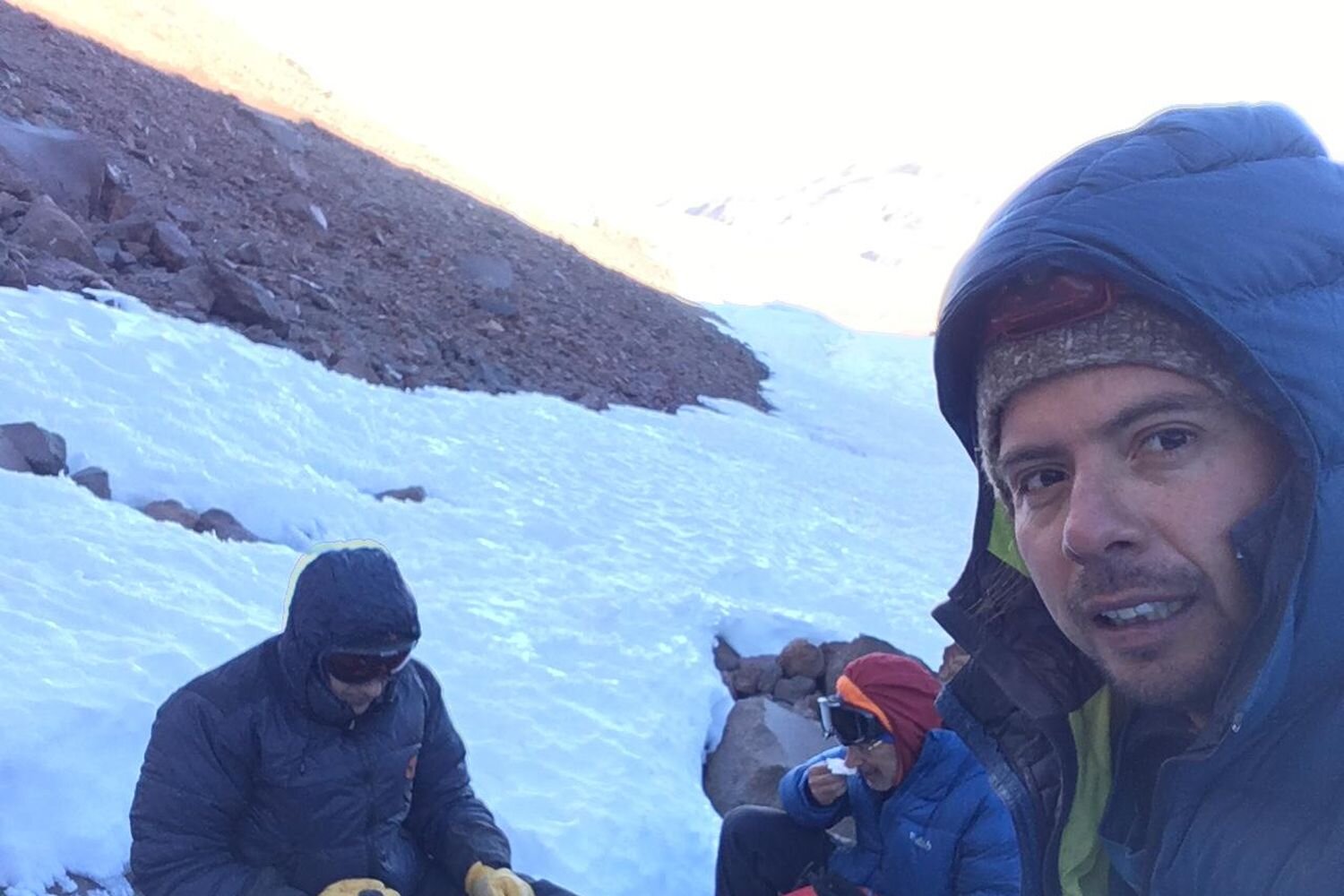  Climbing the last few meters to the summit of Llullaillaco volcano. Chilean Altiplano. 