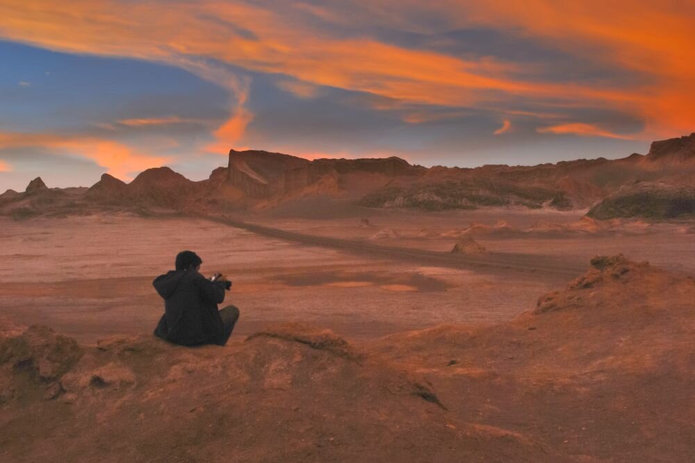  Enjoying the sunset at the Moon valley. Atacama Desert. Chile. 