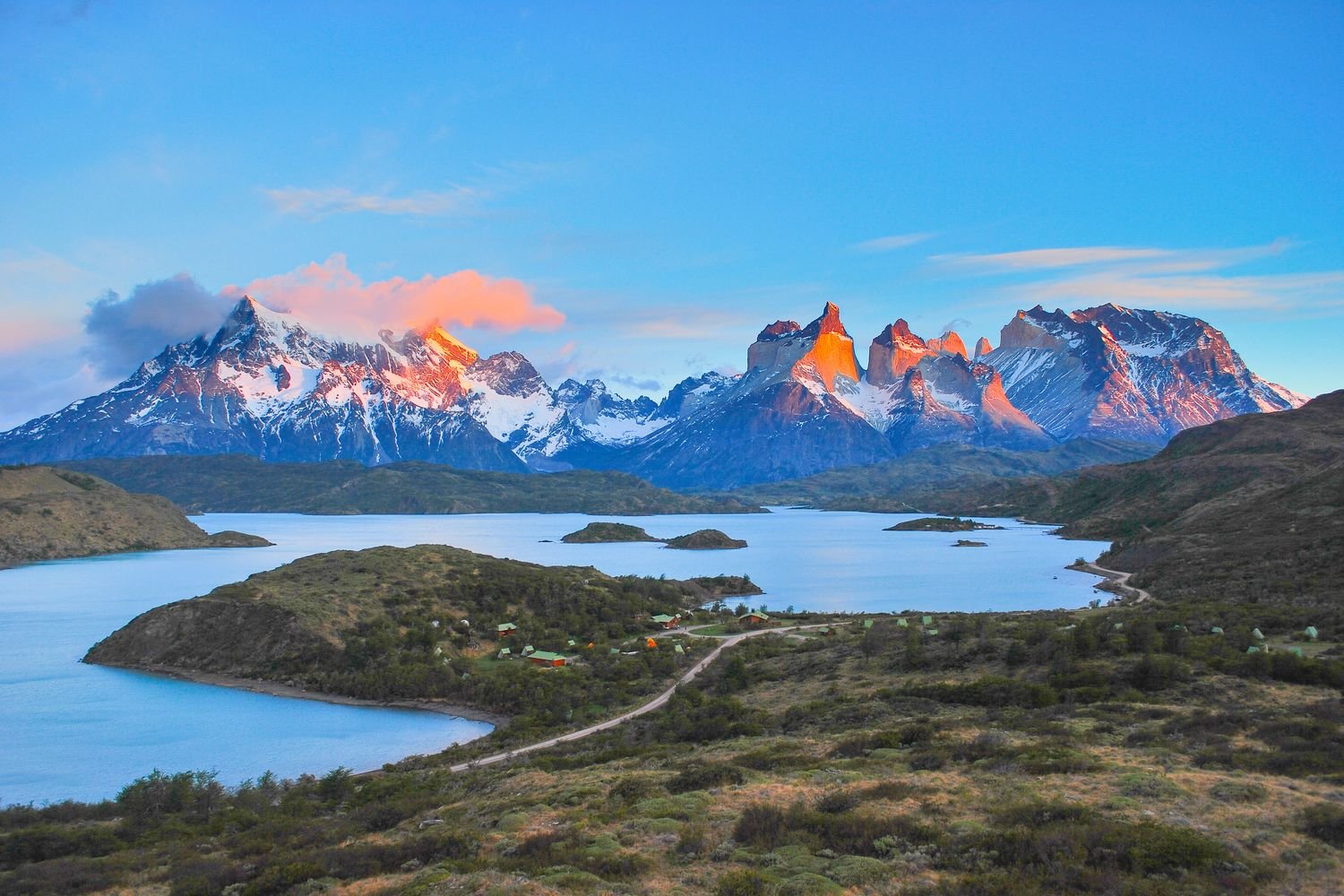 Stunning sunrise over the Torres del Paine mountains captured during a scenic Torres del Paine self-drive tour in southern Chile.