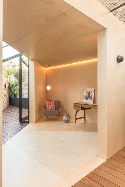 high-quality-birch-plywood-lines-the-interior-of-this-sharply-angular-and-minimalist-backyard-office.jpg