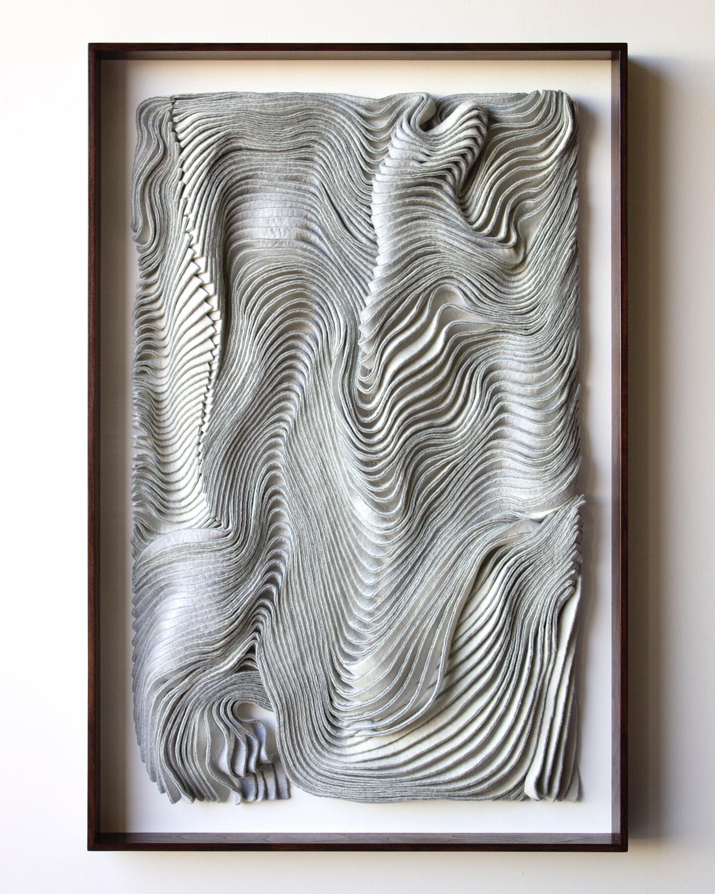 Turn, Shine
32&rdquo; x 48&rdquo; x 4&rdquo;d
Handmade felt, walnut frame
Silk clad onto one side of the fins adds a metallic complexity to the artwork which reveals itself most vividly in natural or direct light. 
This combination, with Potomac blue