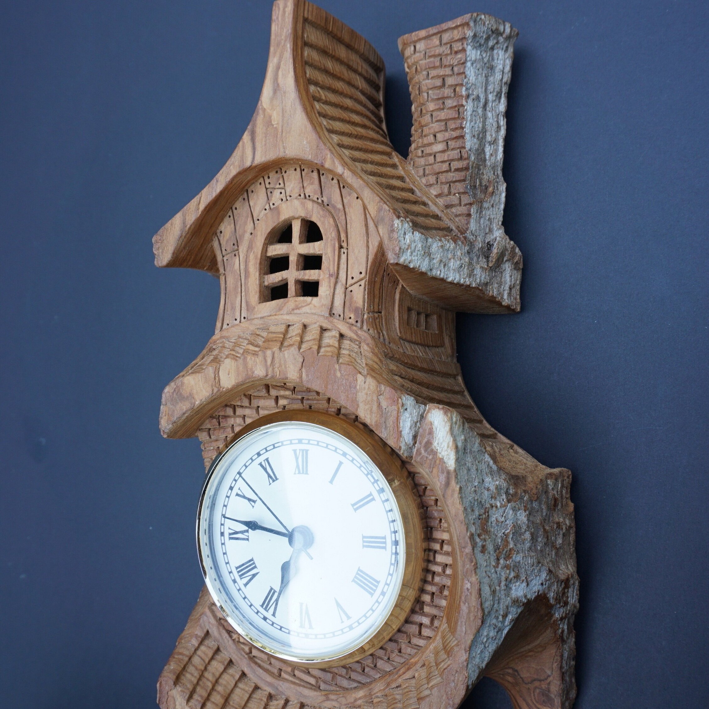 04+Whimsical+house+carving+wooden+clock.jpg