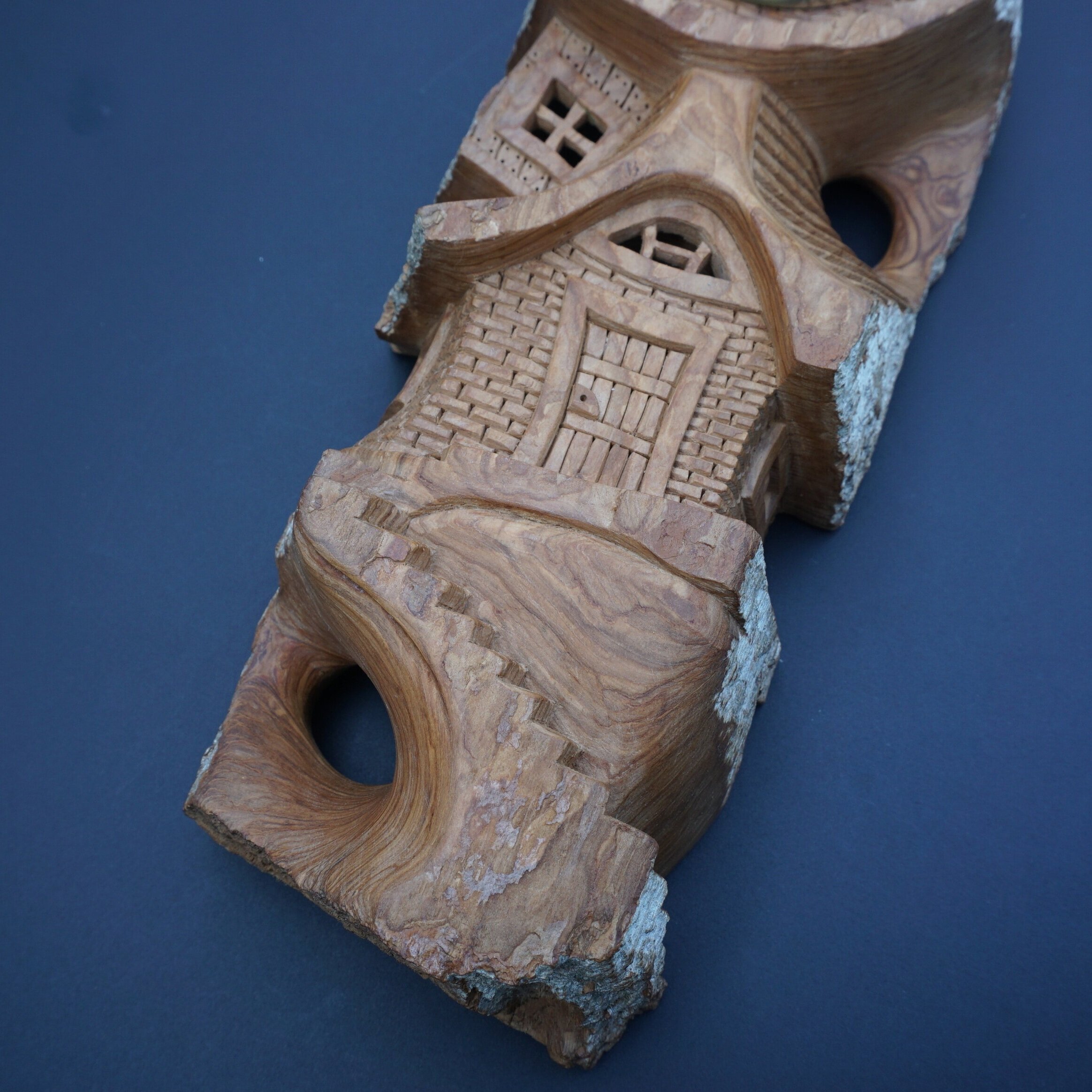05+Whimsical+house+carving+wooden+clock.jpg
