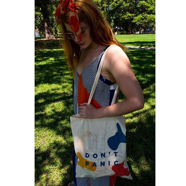 Our graphic designer @s.ofifox taking the 2018 Pustnik totebag for a walk in the park in Sydney, where it&rsquo;s just hitting peak summer. ☀️☀️☀️