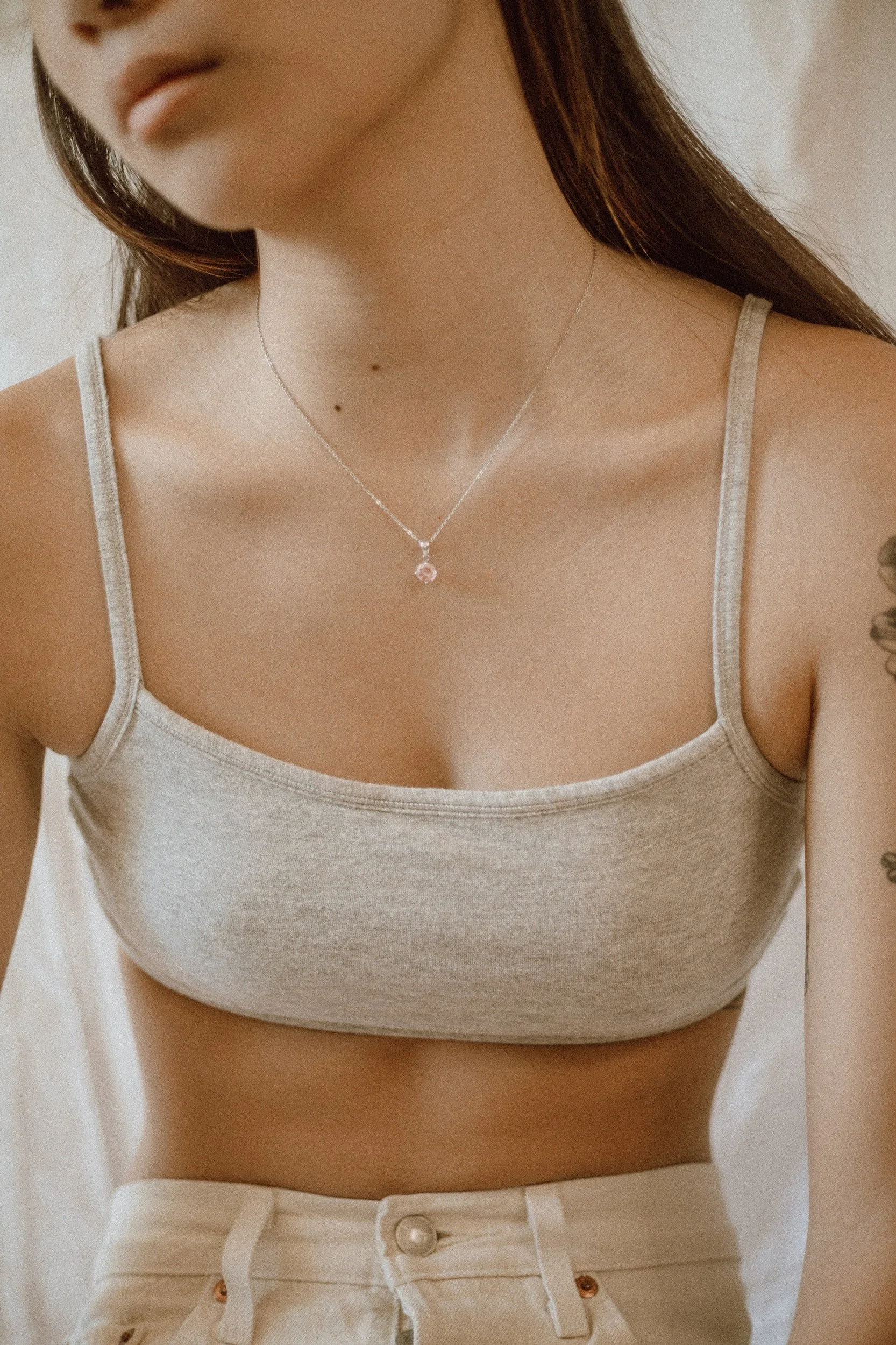 How To Choose the Right Necklace For Your Top's Neckline