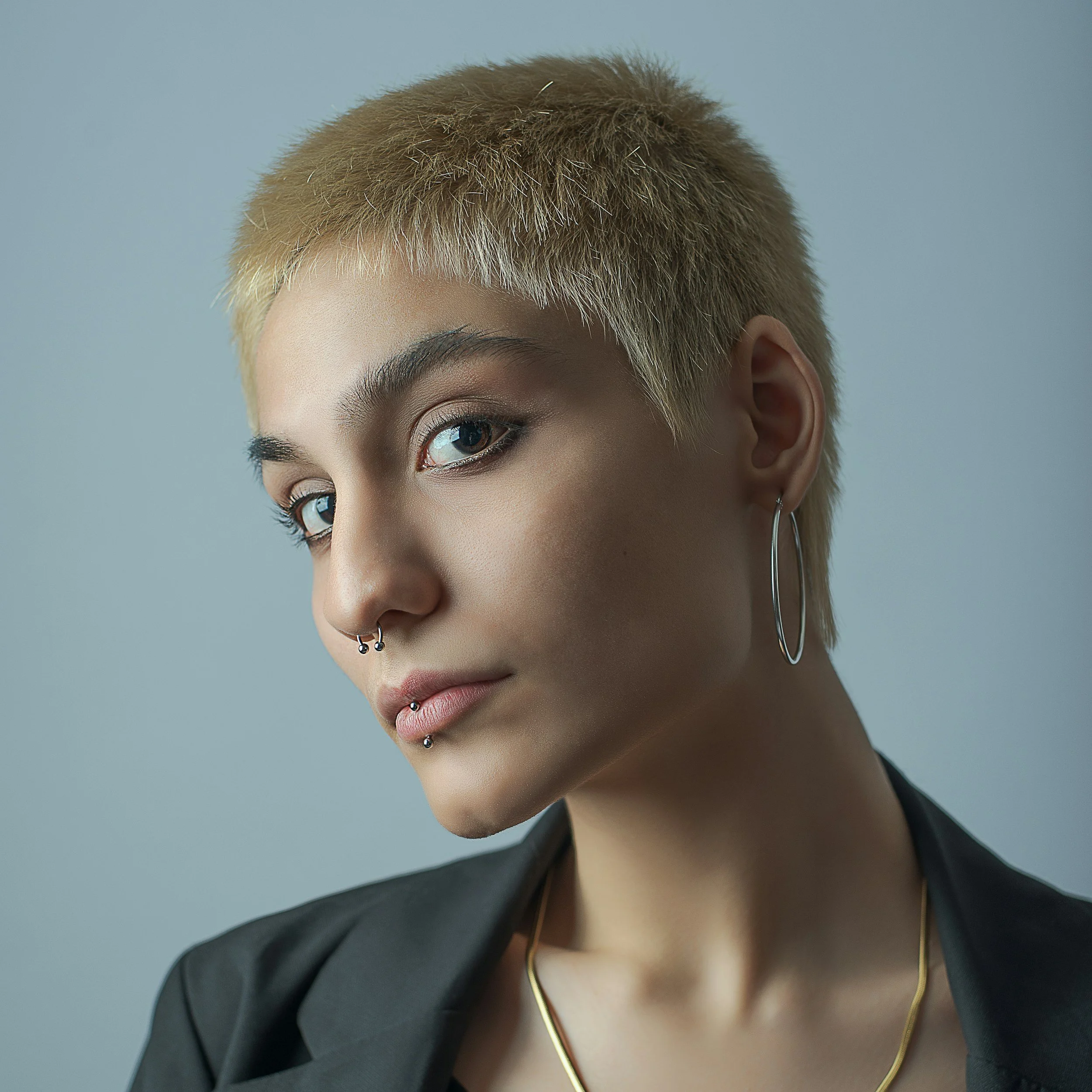 How To Create Harmony Between Facial Piercings And Makeup Style