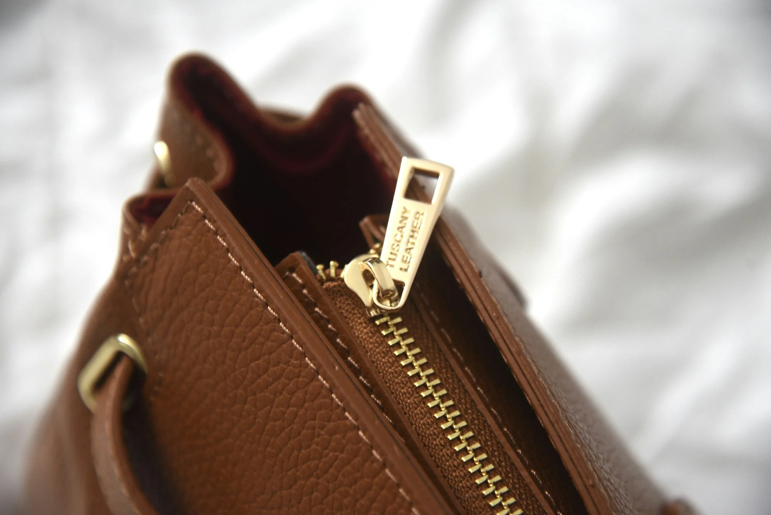 Flyknit vs Leather Handbags: Cost, Durability &amp; Sustainability