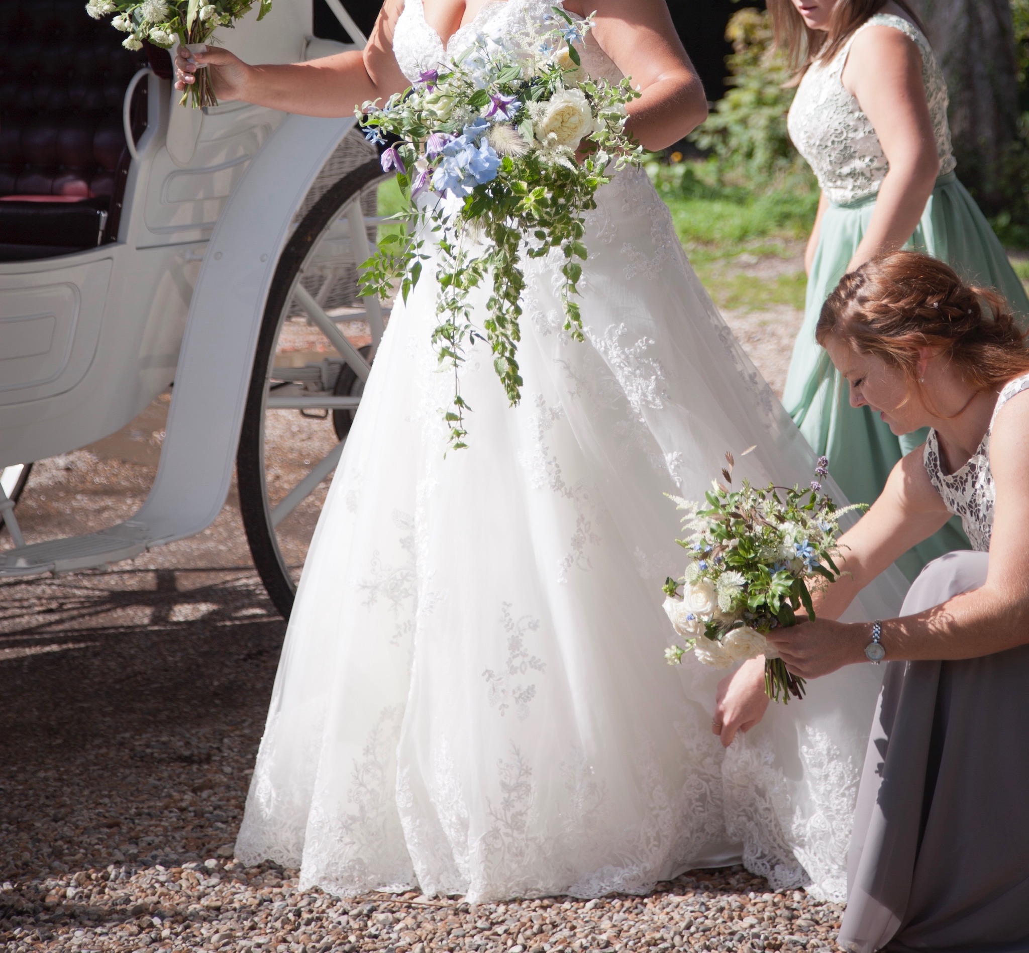 Libby and Bez, Bouquet Tig carriage.jpg