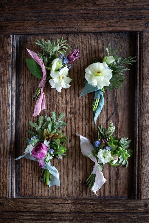 Buttonholes on wooden box.JPG