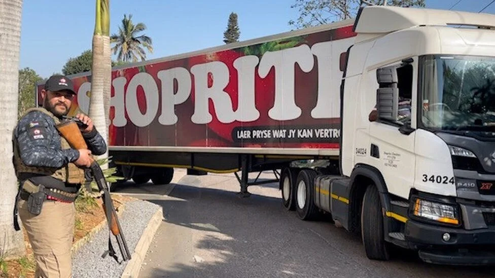 South Africa Zuma riots: Armed police protect food deliveries